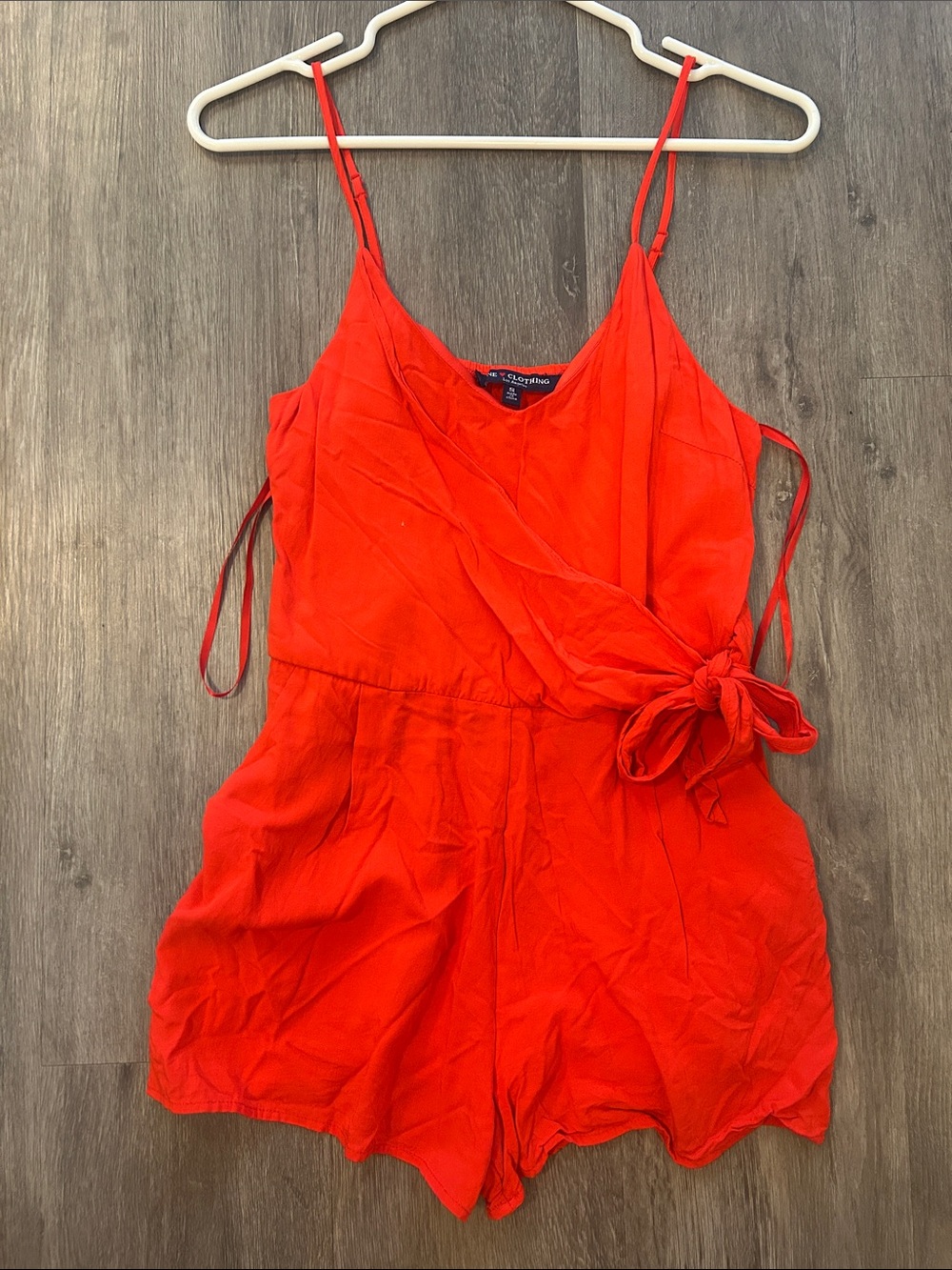 Express Bright Red Sleeveless Wrap Romper with Side Tie